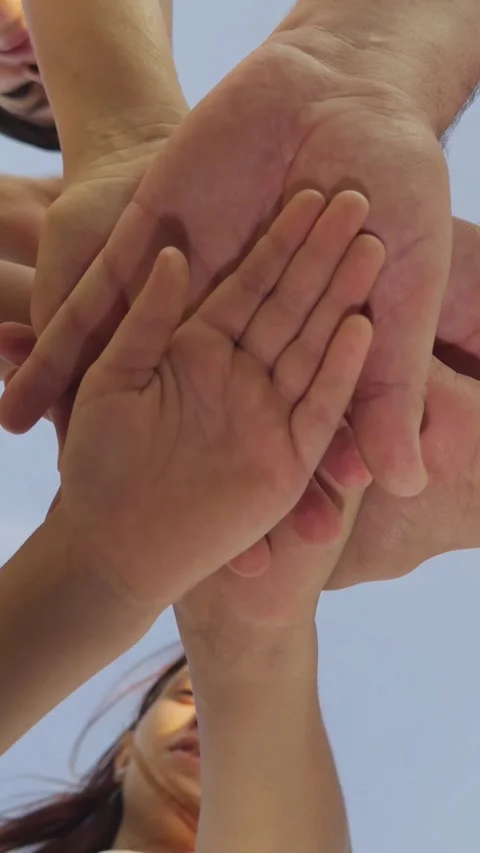 Team shows unity hands. Unity brings group community together. Togetherness Stock Footage 294817575