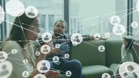 Team sitting sofa with cups node near right-man starting network overlay Stock Footage 333169249