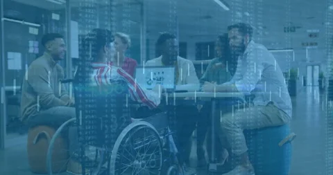 Team sitting at table turning laptop chart for business data insights with code Video stock 314739956