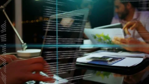 Team sitting tapping tablet starting laptop typing, code overlay linking charts Stock-Footage 335761655