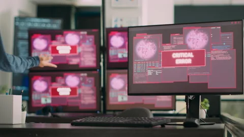 Team of software developers dealing with security breach and hacked it system Stock Footage 224457465