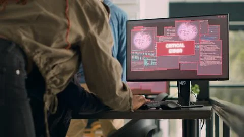 Team of software developers dealing with security breach and hacked it system Stock Photos