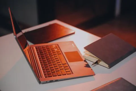 Team of software developers working on big project late at night in neon li.. 库存照片