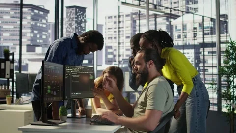 Team of software engineers doing brainstorming in office Stock Footage 318162987