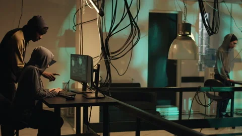 Team of spies committing cyberattack or illegal activities on network system 스톡 동영상 228888391