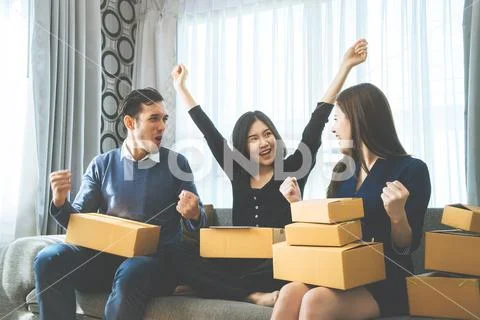 Team of start up business owner celebrating sale order Stock Photos