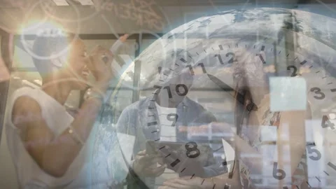 Team stepping placing postits on glass for business plan, man with tablet, clock Stock Footage 335739624