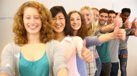 Team of students holding thumbs up Video stock 32818732