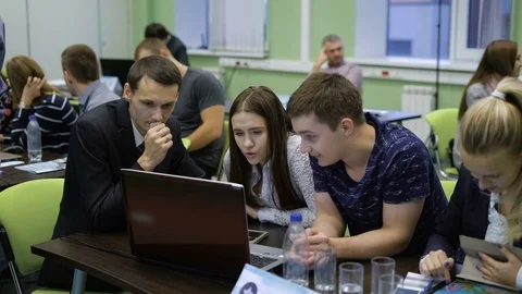 Team of students taking an active part in competition of young professionals Stock Footage 70936059