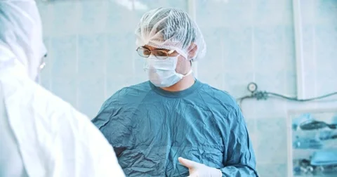 Team of surgeon in uniform perform Stock-Footage 50688715