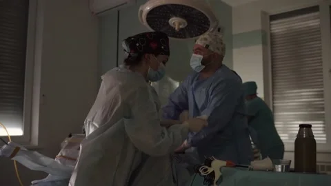 Team surgeon at work in operating room. Modern equipment in operating room. Medi Stock Footage 172212664