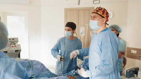 Team surgeon at work in operating room. Modern equipment in operating room Stock Footage 173373614