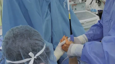 Team surgeon at work in operating room. Modern equipment in operating room 動画素材 203914725