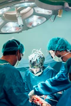 Team of Surgeons Operating. Stock Photos