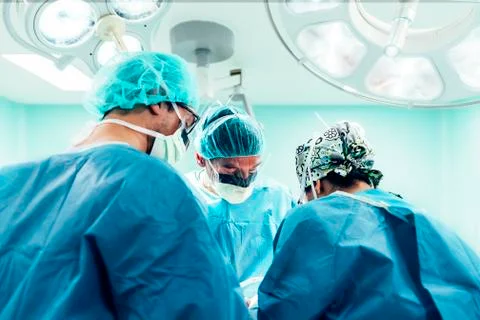 Team of Surgeons Operating. Stock Photos