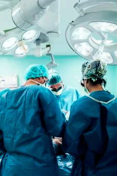 Team of Surgeons Operating. Stock Photos