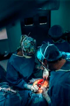 Team of Surgeons Operating. Stock Photos