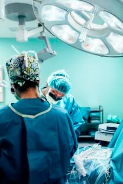 Team of Surgeons Operating. Stock Photos