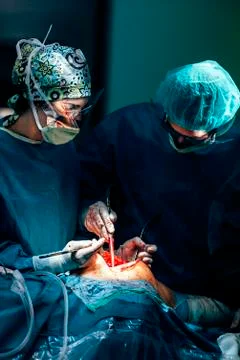 Team of Surgeons Operating. Stock Photos