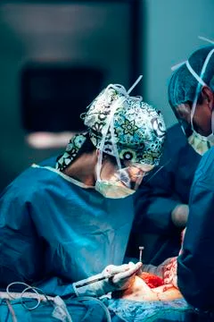 Team of Surgeons Operating. Stock Photos