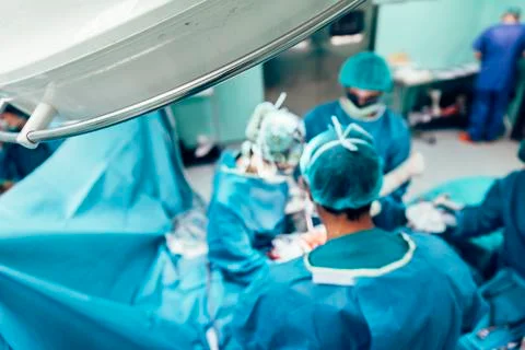 Team of Surgeons Operating. Stock Photos