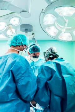 Team of Surgeons Operating. Stock Photos