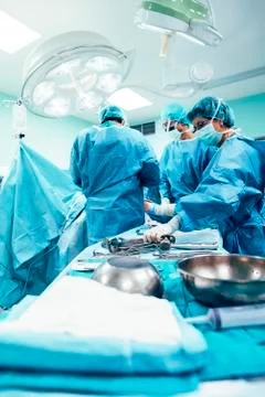 Team of Surgeons Operating. Stock Photos