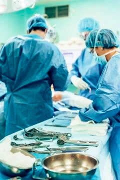 Team of Surgeons Operating. Stock Photos