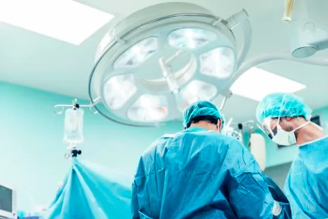 Team of Surgeons Operating. Stock Photos