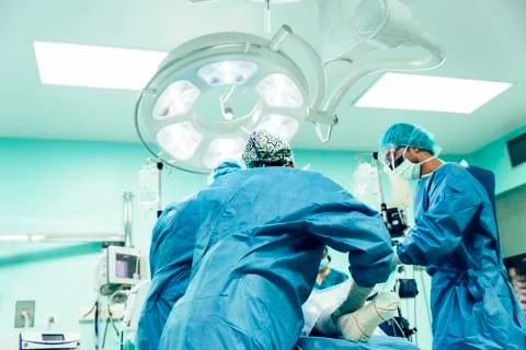 Team of Surgeons Operating. Stock Photos