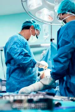 Team of Surgeons Operating. Stock Photos