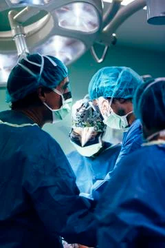 Team of Surgeons Operating. Stock Photos