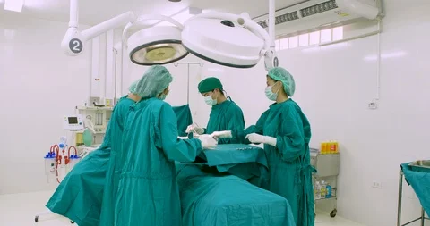 Team of surgeons in operating theater. Stock Footage 90514324