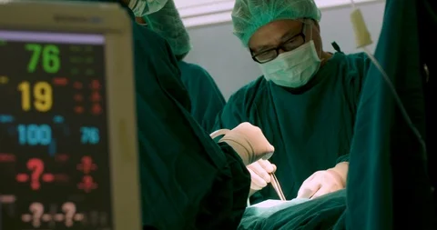 Team of surgeons in operating theater. Stock Footage 90521097