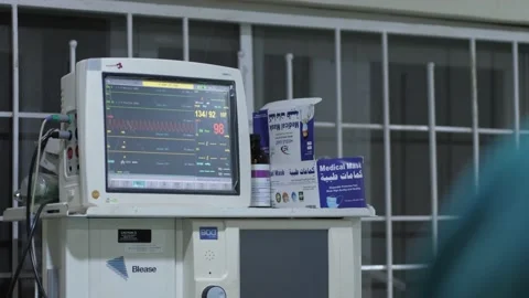 Team of surgeons in operating theater performing operation on a patient . Видео 156015568