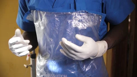 Team of surgeons in operating theater performing operation on a patient . 動画素材 165382570