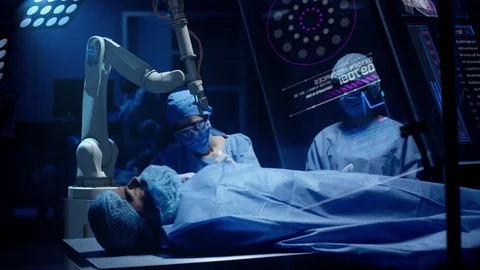 Team of surgeons perform a delicate operation using medical surgical robot Vídeo Stock 121342337