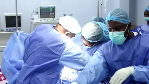 Team of Surgeons in a theatre Stock Footage 271002299