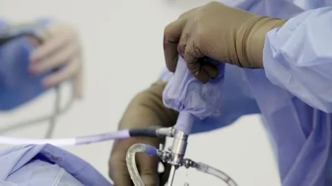 A team of surgeons at work in the operating room. Stockbeeldmateriaal 269445932