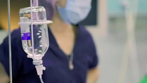A team of surgeons at work in the operating room. Stock Footage 270461875