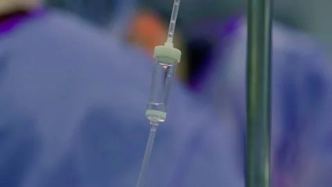 A team of surgeons at work in the operating room. Stock Footage 270468376