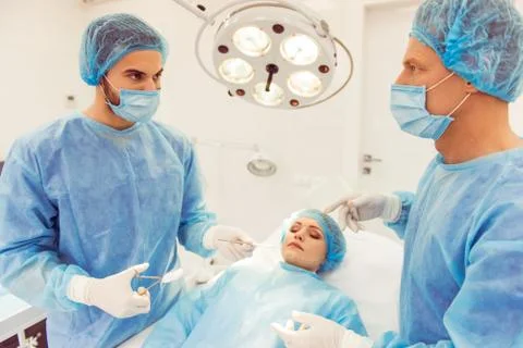 Team surgeons at work Stock Photos
