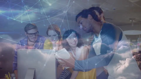 Team swiping tablet and pointing at screen, causing cloud computing overlay Stock Footage 316191052