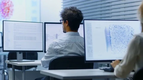 Team of Talented Computer Engineers Programming at Their Workstations.  Stock Footage 81265926