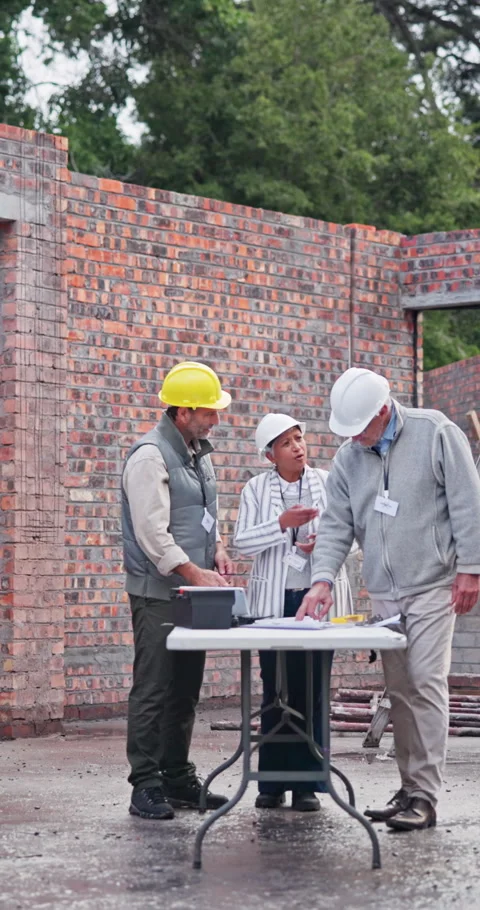 Team, talk and document at site for construction, discussion and report for Stock Footage 340948334