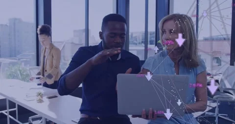 Team tapping laptop and tracing rising animated arrows in business meeting for Stock Footage 318237861