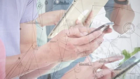 Team tapping tablets and phones, swiping, showing tech charts for work while Stock Footage 331565598
