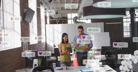 Team in tech planning reviewing tablet and folder woman scrolling sparking Stock Photos