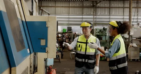 Team of technician is checking machine to ready for work in industrial factory.  Stock Footage 168940804