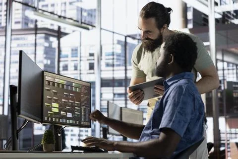 Team of technicians creating machine learning models Foto stock
